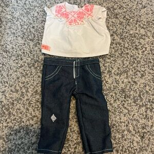 Charming Doll Ensemble with White and Pink Top and Dark Blue Pants